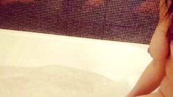 hairy pussy takes off her panties and bathes in a foam bath