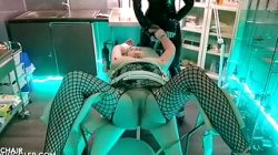 Young busty blonde pays ass fucked in the Anal Gyno chair